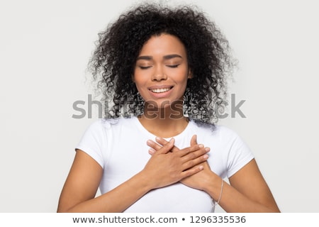 Stock fotó: Beautiful Happy Young Woman Holding Hands In Grateful Gesture Isolated