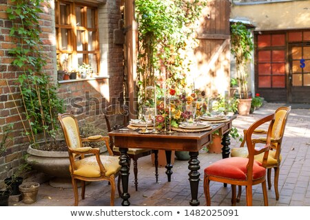 Foto stock: Laid Table With Flowers And Decorations At Wedding Reception