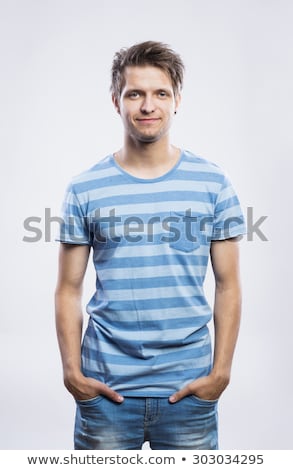 [[stock_photo]]: Stylish Man In Blue Shirt With Earring Isolated On White