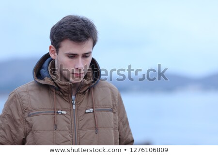 Zdjęcia stock: Young Man Sad Looking Down