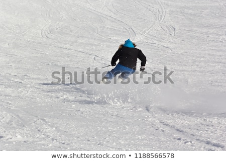 Foto stock: Skiing At Ski Resort Blured Skier In Fast Motion Extreme Sport