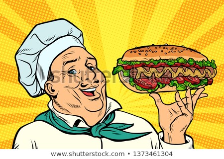 Foto stock: Cook Chef Man Presentation Gesture Hot Dog Sausage With Salad