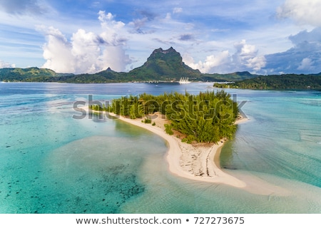 Foto d'archivio: Bora Bora In French Polynesia Aerial View Of Motu Coral Lagoon And Mount Otemanu