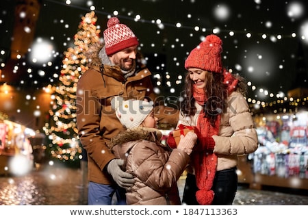 Stock photo: Happy Woman Over Christmas Tree In Tallinn
