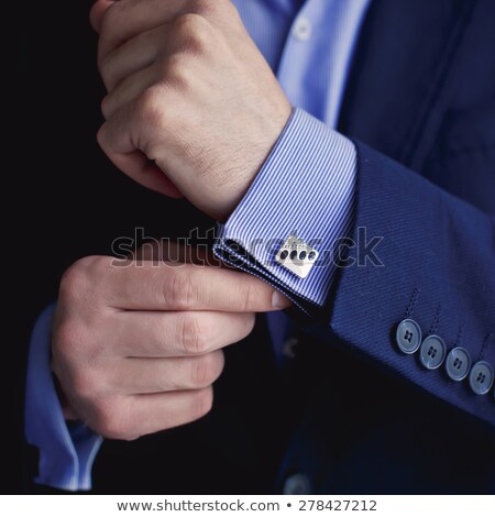 Stockfoto: Man Buttons Cuff Link On Cuffs Sleeves Luxury White Shirt