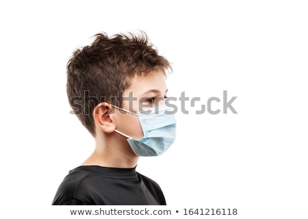ストックフォト: Teenager Boy Wearing Respiratory Protective Medical Mask Side View
