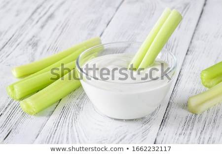 Stock fotó: Celery Stalk Dipped In Yogurt