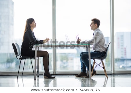 Foto stock: Businesswoman And Businessman Having A Discussion