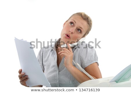 Stock fotó: Woman On The Phone Next To A Fax Machine