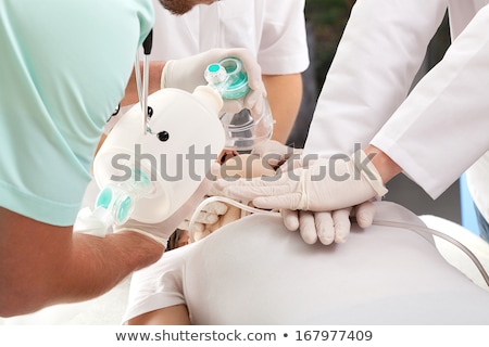Сток-фото: A Doctor And A Nurse Resuscitating A Patient