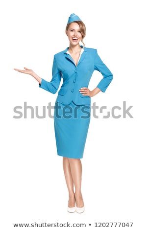 Foto stock: Young Flight Attendant Isolated On The White