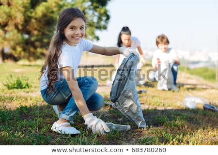 Stock photo: Kid With Rubbish