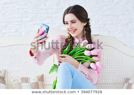 Foto stock: Woman Taking Herself A Selfie