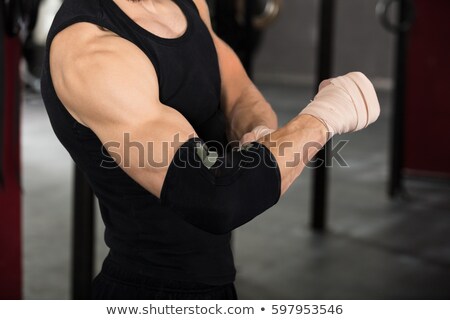 [[stock_photo]]: Athlete Person Wearing Bandage On Elbow