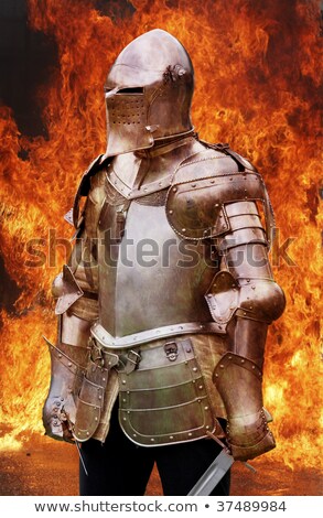 Foto stock: Knight In Armour Suit With Silver Sword