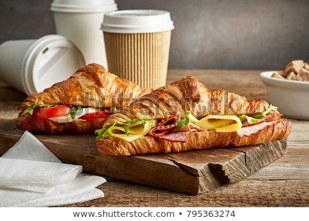 Foto stock: Coffee And Croissant Sandwich