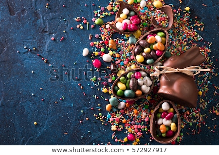 Stock photo: Chocolate Eggs Easter Bunny And Candies On Wood