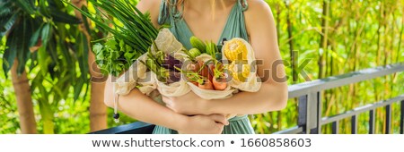 Stock fotó: Set Of Fresh Vegetables In A Reusable Bag In The Hands Of A Young Woman Zero Waste Concept Banner
