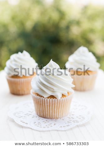 Stok fotoğraf: Vanilla Cupcake With Butter Cream Icing