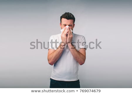 Foto stock: Sneezing Man With Handkerchief