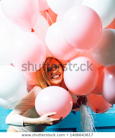 Foto d'archivio: Young Happy Blonde Real Woman With Baloons Smiling Close Up Lifestyle Real People Concept