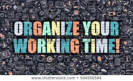 Stock foto: Organize Your Working Time On Dark Brick Wall