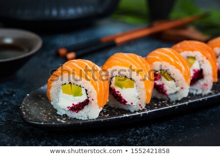 [[stock_photo]]: Philadelphia Sushi Rolls With Chopsticks