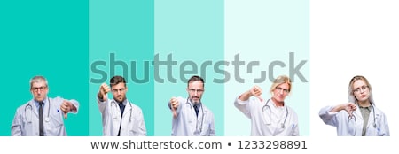 Foto stock: Doctor Showing Thumb Down Sign