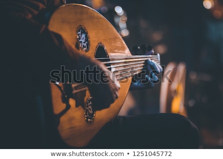 ストックフォト: Arab Man Playing Musical Instrument