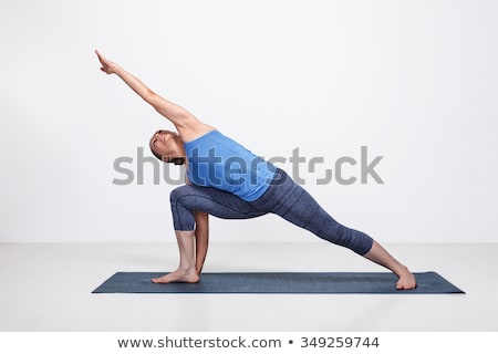 Stok fotoğraf: Woman Doing Ashtanga Vinyasa Yoga Advanced Asana