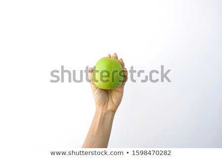 Foto d'archivio: Woman Holding Green Apple