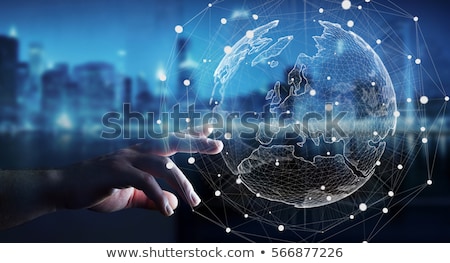 Foto stock: Global Business - A Businessman Holding World