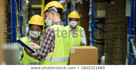 Foto stock: People Work With Boxes Teamwork