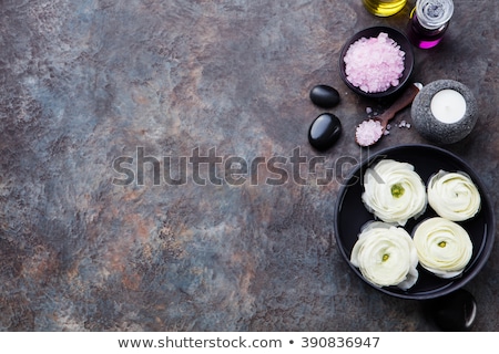 Stok fotoğraf: Spa And Wellness Massage Setting Still Life With Essential Oil Salt And Stones Copy Space Top View