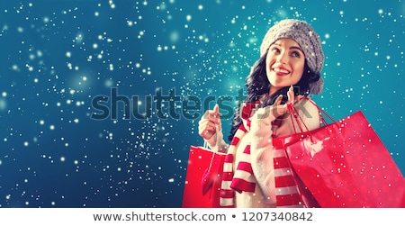 Stock fotó: Happy Young Woman Shopping For Christmas Gifts