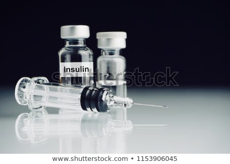 ストックフォト: The Word Diabetes With Insulin And Syringe