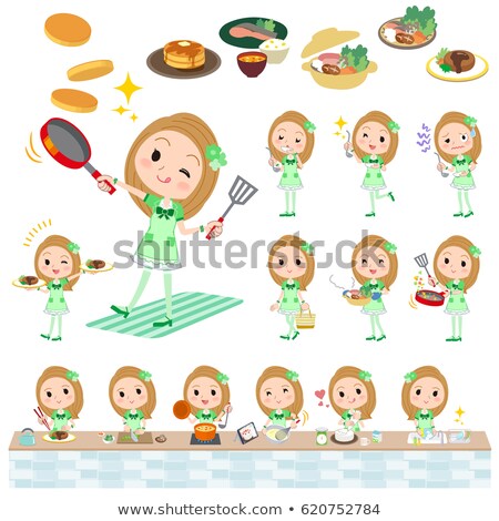 Stock photo: Pop Idol In Green Costume Cooking