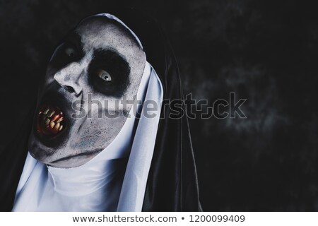 Stock foto: Frightening Evil Nun With Bloody Teeth