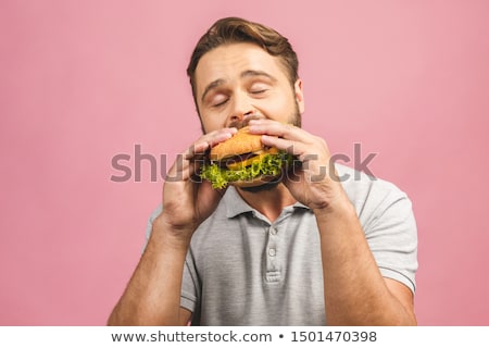 Сток-фото: Man Eating Burger