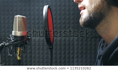 Stock fotó: Composer Listening To New Song