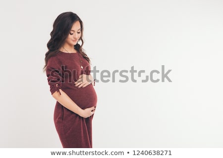 ストックフォト: Image Of Pregnant Woman Touching Her Belly With Hands