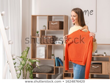 Stok fotoğraf: Portrait Of Pretty Fashionable Woman Trying New Clothes Fashion