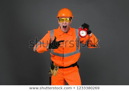 Сток-фото: Angry Foreman Holding Alarm Clock