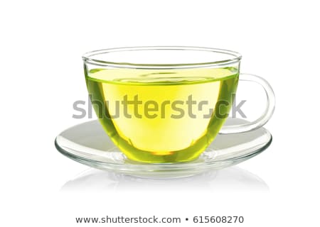 Stock fotó: Green Tea Cup On Green Background