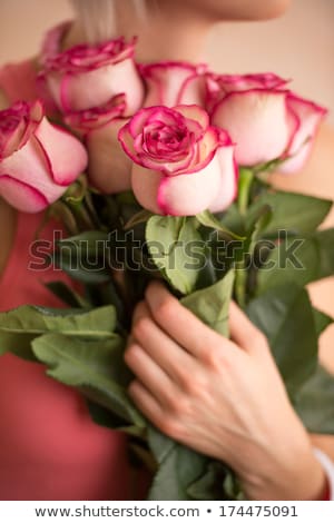 Stok fotoğraf: Unrecognizable Woman Holding Bouquet Of Pink Roses