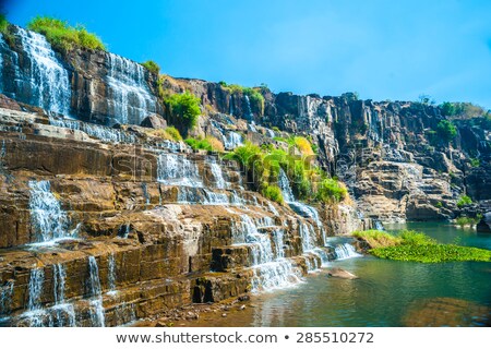 Foto stock: Tropical Rainforest Landscape With Flowing Pongour Waterfall In Vietnam