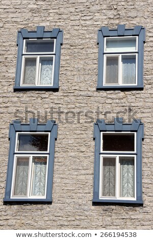 Stockfoto: Wooden Windows Over An Old Building In Quebec