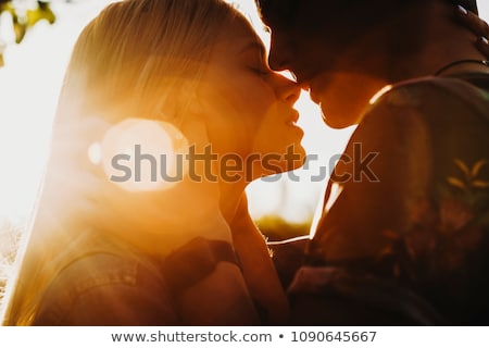 Foto stock: Couple Kissing At Sunset