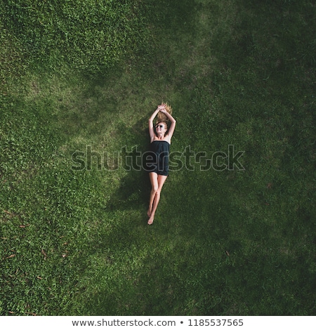 Stock fotó: Pretty Woman Lying On The Grass