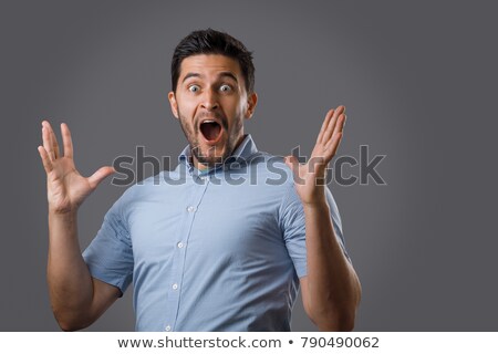 Foto stock: Surprised Man Against White Background